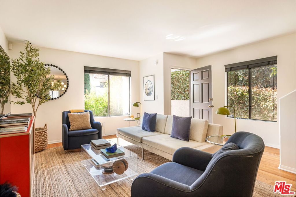 Stylish, spacious, and perfectly located -- Welcome to 4355 Clayton Ave, your dreamy townhouse-style condo in coveted Los Feliz. Tucked behind lush flowering hedges in a boutique 4-unit complex, this 2 bed, 3 bath property hits that sweet spot between cool and comfortable. With an open kitchen, warm wood floors and sun-drenched living spaces, it feels made for both chilling and entertaining. Two oversized bedrooms each with their own ensuite bathroom, plus there's a powder room for guests and an attached garage that's actually big enough for your gear and your car. Venture outside and you're just a few blocks from all the action on Hillhurst -- think cute cafes, indie shops, juice bars, workout studios, and iconic neighborhood hangouts. You're a stone's throw from Silver Lake, the trails at Griffith Park, and cult-fave coffee at Maru just 0.6 mi away. Erewhon? Basically a mile. This is your chance to live where everyone wants to hang. Come check it out and feel the vibe for yourself!