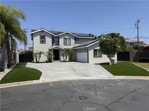 Photo of 14695 Candeda Place #1, Tustin, CA 92780 (MLS # OC26123600)