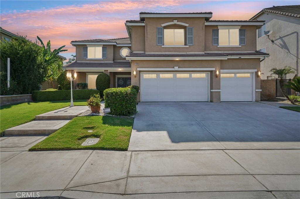 Stunning Home in the Prime Eastvale neighborhood.
Welcome to this gorgeous 5-bedroom residence nestled in the heart of Eastvale, where elegance meets modern living. This exquisite home boasts custom flooring and sophisticated crown molding throughout, complemented by planation shutters that enhance the natural light. The spacious family room features a cozy fireplace perfect for gatherings, while the formal living and dining rooms offer an inviting atmosphere for entertaining. The butler's gourmet kitchen is a chef's dream, complete with a walk-in pantry, center island, and plenty of granite counters. Convenience is key with a full bedroom and bathroom located on the first floor. Bonus room may be used as Office/Gym room downstairs. Leading upstairs custom flooring, generous loft area, four well-appointed bedrooms and 2 full bathrooms along with laundry room for added ease. Master bedroom/bathroom retreat offers, extension sitting area, walk in closet, bathtub and shower, dual sinks and separate toilet room. The property includes a 3-car garage and a beautifully designed front and backyard with a covered patio cover ideal for outdoor relation. The front showcases extensive concrete work and elegant steps leading to the front door. Located in a pristine neighborhood with access to outstanding schools, parks, close to freeway and international airport of Ontario. This home is perfect for families seeking comfort and style in Eastvale. Don't miss the chance to make this dream home your own!