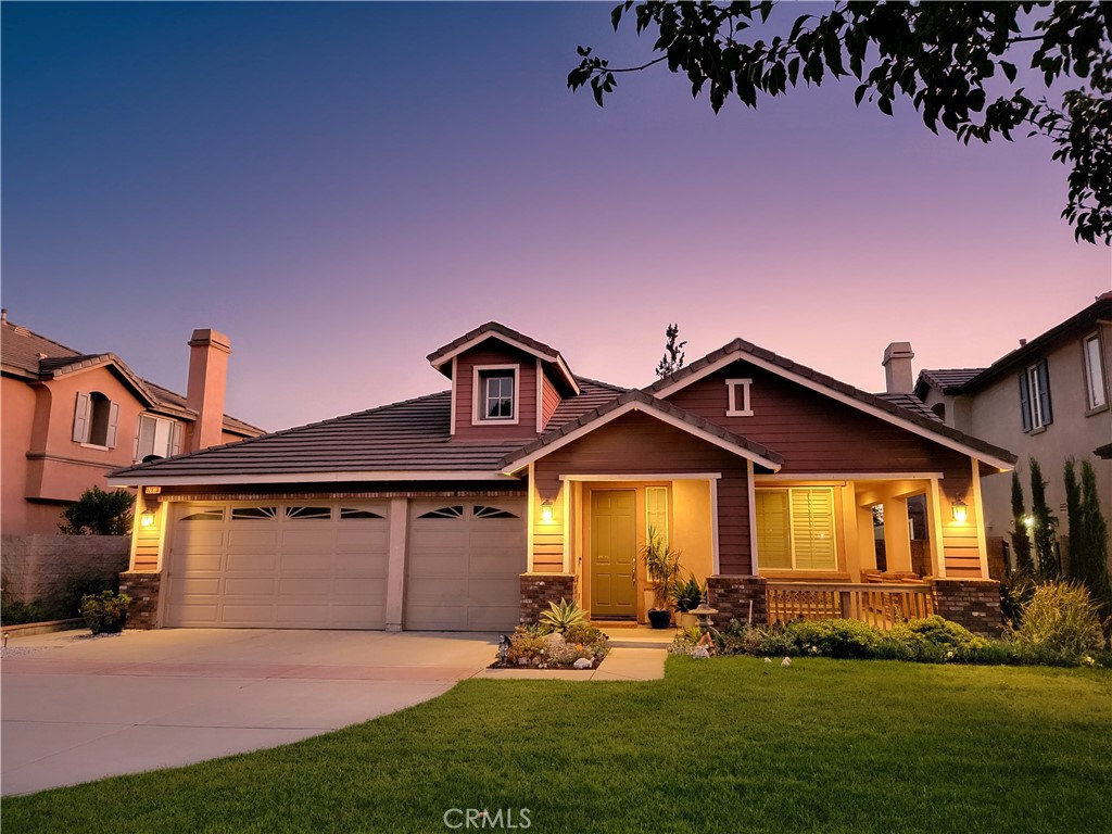 This elegant and spacious 3Bd 2Ba single-story house on a cul-de-sac in the Victoria Gardens neighborhood is a perfect blend of Craftsman and Ranch styles, featuring gable roofs, an extended L-shaped porch, and big windows with shutters that emphasize the exterior’s horizontal lines. The open floor plan, extra-high ceilings, and crown moldings exude the luxurious feeling of lofty vertical interior space. Sophisticated finishes include large-format stone tiles in the common areas, solid mahogany hardwood in the bedrooms, and granite countertops throughout the bathrooms and kitchen, which is completed with stainless steel appliances. An attached pergola with stone-paved flooring in the backyard extends the living space outdoors. Even with all this, there is still enough square footage to add a swimming pool, a guesthouse, or both.
Virtual Tour Video Link: https://www.wellcomemat.com/video/5b5m6d53d1c41m7eu/RCUC/CA/91739/Crestfield/PW25140244/
