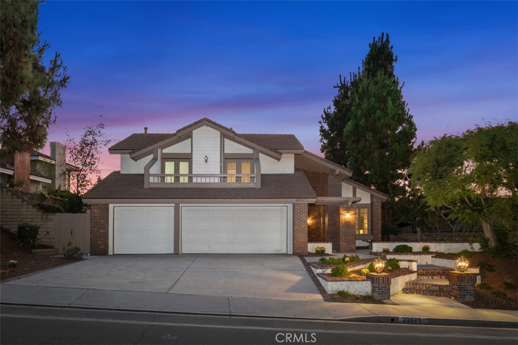 LAKE VIEWS • PRIVATE SPA • PRIME LOCATION IN HIGHLY DESIRABLE ANDALUSIA COMMUNITY! Welcome to this stunning Casa Grande model, ideally located in the sought-after Andalusia neighborhood of Mission Viejo. This beautifully designed home offers a perfect blend of luxury, comfort, and lifestyle—all just minutes from the lake, parks, and local conveniences. Inside, soaring ceilings and expansive windows flood the space with natural light. The open and spacious layout begins with a grand foyer leading to a formal living room and elegant dining area, complete with a wet bar and French doors that open to the outdoors. The inviting family room features a cozy fireplace and dual French doors leading to a tranquil backyard with a private spa and breathtaking lake views—ideal for entertaining or relaxing under the sunset skies. The chef’s kitchen is equipped with stainless steel appliances, double ovens, abundant cabinetry, and a sunlit breakfast nook framed by windows overlooking the backyard and lake. A main-floor bedroom and full bath with private water closet offer versatile space for guests, a home office, or multigenerational living. Upstairs, the expansive primary suite is a true retreat with a fireplace, private balcony with lake views, dual mirrored closets (including a walk-in), and a luxuriously remodeled en-suite bath featuring a soaking tub, oversized step-in shower, dual vanities, and a private water closet. Three additional spacious bedrooms are located on the opposite side of the upper level—two with French doors opening to a shared balcony overlooking the greenbelt. A full hallway bath features dual vanities and a separate tub/shower area. Also upstairs is a convenient laundry chute. Additional highlights include an interior laundry room with sink, a generous 3-car garage, and a rare, expansive greenbelt directly across the street—offering added privacy and a serene setting for morning walks or outdoor play. Enjoy exclusive Lake Mission Viejo membership with access to swimming, boating, paddleboarding, summer concerts, fireworks, and events. Stroll along scenic neighborhood paseos to Main Beach, East Beach, Olympiad Park, Little League fields, and Market on the Lake with shopping and dining just minutes away. Plus, you're just 20 minutes to world-class beaches, luxury resorts, Dana Point Harbor, and the vibrant Lantern District. Welcome Home!