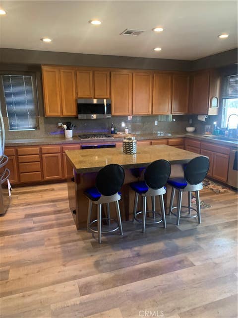 Photo of 23682 Saratoga Springs PL, Murrieta, CA 92562 (MLS # PW26176052)