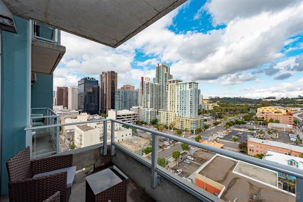 Available July 27th! FULLY FURNISHED STUDIO (NOT A 1 BEDROOM) on the 14th floor with an AMAZING VIEWS!!! SEE THE PHOTOS TO REALLY APPRECIATE THIS LARGE-LOVELY STUDIO UNIT IS FULLY FURNISHED WITH FURNITURE AND ALL APPLIANCES INCLUDED, PLUS IT'S LOCATED ON THE 14TH FLOOR WITH A NORTH-WESTLY VIEW FROM YOUR OWN PRIVATE BALCONY...SEE SUPPLEMENTAL REMARKS BELOW FOR MORE DETAILS. Available NOW! FULLY FURNISHED! YES, WASHER AND DRYER AND REFRIGERATOR IS INCLUDED. YOU ONLY PAY FOR YOUR ELECTRIC BILL AND CABLE BILL. DON'T MISS THIS 14TH FLOOR UNIT STUDIO, APPROX. 500 SQFT. PLUS A VERY SECURE 1-CAR UNDERGROUND PARKING, LOCATED IN THE HIGHLY DESIRABLE "SMART CORNER" COMPLEX, VERY OPEN AND BRIGHT FLOOR PLAN, YOUR OWN PRIVATE BALCONY TO ENJOY CITY VIEWS/LIGHTS, THE OCEAN, THE MOUNTAINS, BUILT 2007 WITH CONTEMPORARY DESIGN,CONCRETE WALLS/CEILING, GRANITE COUNTERS, TILE FLOORING & UPGRADED DESIGNER CARPET. AMENITIES INCLUDE A GYM & ROOFTOP WITH PANORAMIC VIEWS OF THE CITY, THE OCEAN, AND THE MOUNTAINS. COMMON AREAS INCLUDE ACCESS TO THE GYM, BBQ, SUN DECK & SPA. CONVENIENTLY LOCATED NEXT TO A TROLLEY STOP, EASY ACCESS TO FWYS. 163 & 5. VERY SHORT WALK TO BALBOA PARK, PETCO PARK & TO THE FAMOUS GASLAMP QUARTER DISTRICT