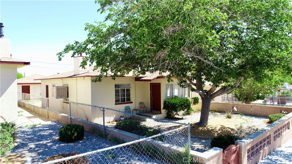 Merrill Street is a 2 bed / 1 bath home with 825 SF of living space on a 5,400 SF lot. The seller has several single family homes for sale in Victorville. A home owner or investor can purchase one property or a package of properties. This is a great investment 1031 investment opportunity in downtown Victorville. The properties are freeway close and near Costco, Big Lots, Food 4 Less, Home Depot, Victor Valley Hospital and many other stores and restaurants. The High Desert is growing. The Barstow International Gateway and the Brightline High Speed rail project are creating thousands of new jobs in the area. The MLS ID #s for the properties are the following: OC25104945, OC25104977, OC25109132, OC25109194, OC25109203, OC25109249, OC25109271, OC25109288, OC25109293, OC25109324, and OC25109334.