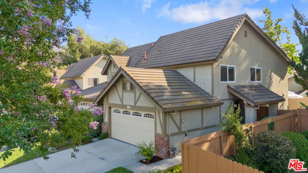 Beautifully Remodeled and Spacious home in Prime Agoura Hills. Welcome to this stunning 3 bedroom, 3-bathroom townhome located in the highly desirable Stonecrest Patio Homes community in the heart of Agoura Hills. This spacious and tastefully remodeled residence offers an exceptional floor plan, ideal for both comfortable living and elegant entertaining. The light-filled living room features great seating, a cozy fireplace, and walls of glass with French doors that open to a private patio and newly reimagined garden perfect for indoor-outdoor living. Enjoy both formal dining and a separate breakfast room for flexible dining options. The expansive primary suite boasts vaulted ceilings, a walk-in closet, large dual vanity bathroom, and a bonus den/office, creating a perfect retreat. Situated directly across from the community pool, spa, and tennis court, this home enjoys unbeatable accessibility to all amenities. Nestled within the award-winning Las Virgenes School District and just minutes from scenic hiking trails, shopping centers, and freeway access, this townhome offers the best of location, lifestyle, and comfort.