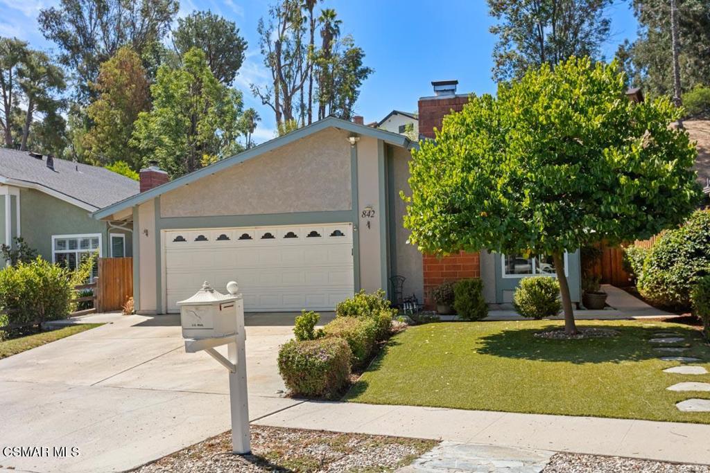 Beautiful single story ranch home was completely remodeled a few years ago. Popular Atrium floor plan has 3 bedrooms and 2 upgraded bathrooms. Spectacular kitchen with newer designer cabinets and granite counter tops. Opens to family room with a skylight bringing in natural sunlight. Spacious primary bedroom has a skylight and opens to the closed in atrium. Sun room offers additional living space that brings the outdoors to the indoors. Popular wood/like flooring throughout. Dual pane windows, ceiling fans in every room. Tankless water heater & air conditioning. Beautifully manicured private entertainers' rear yard with gazeebo, covered patio and fruit trees. 2 car garage, solar lease, great location and close to everything, Community pool, spa and off-site RV parking within the neighborhood. This home shows very well.