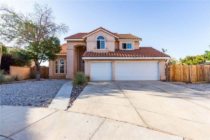 Welcome to 13198 Blue Mesa Ct, a beautifully upgraded 5-bed, 3-bath home nestled in a quiet cul-de-sac in Victorville. With approximately 2,233 sq ft of living space on an 8,200 sq ft lot, this residence offers comfort, style, and functionality for modern family living.

Step inside to discover a thoughtful layout with one bedroom and a full bath conveniently located on the main level — perfect for guests or multi-generational living. Upstairs you’ll find the spacious primary suite with a private balcony, three additional bedrooms, and two more full baths. The open living areas include a cozy family room with a fireplace, an eat-in kitchen, and a formal dining area, all enhanced by vaulted ceilings that create a bright, airy atmosphere.

This home has been updated for peace of mind and efficiency, featuring brand new dual-pane windows, a new HVAC system and furnace, new water heater, and wireless smart thermostat.

Enjoy the large backyard with plenty of space for entertaining, gardening, or even adding a pool. Additional highlights include RV parking, a 3-car garage, and a low-maintenance front yard. Located near shopping, schools, and freeway access — with no HOA — this home combines convenience with flexibility.

Don’t miss your chance to own this Victorville gem that’s move-in ready and full of potential! Schedule your private showing today.