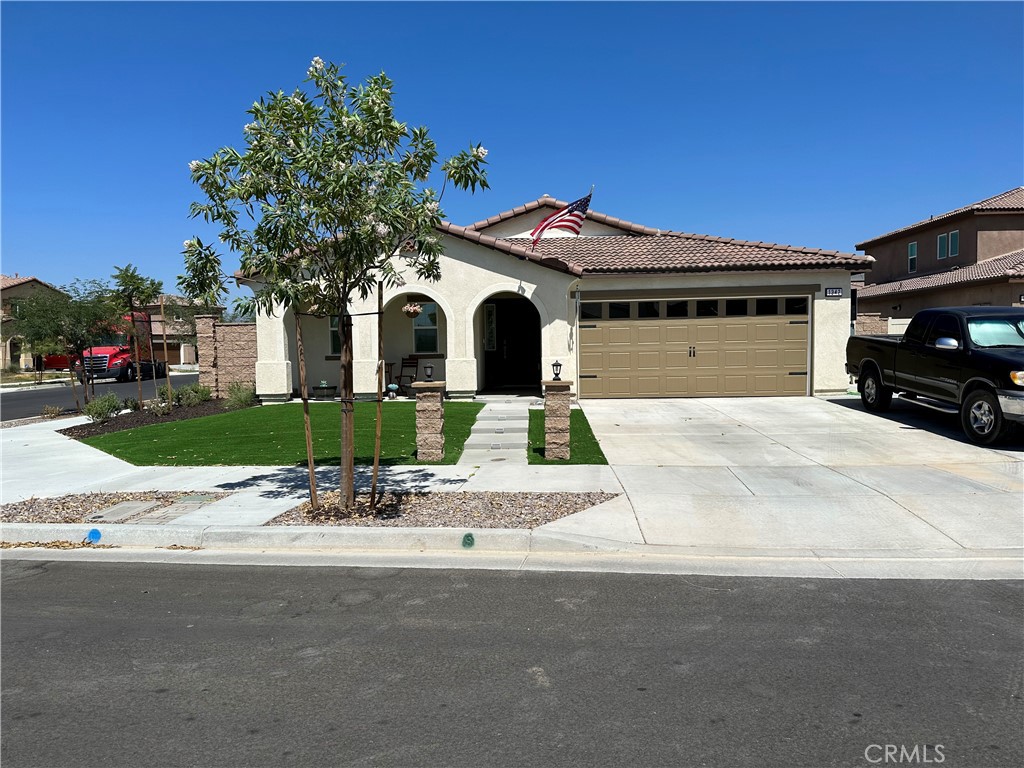 Welcome to this beautiful and spacious 4-Bedroom, 3-Bath home featuring 1898sq.ft. of living space. Start by enjoying the curbside appeal of limited maintenance landscape and the serene front porch sitting area which is exclusive to this model before stepping into an upgrade hallway leading to you open concept great room, island kitchen, dining combination. The expansive main bedroom offers a beautiful on suite featuring a walk-in shower, dual-sink vanity, private commode and large walk-in closet with barn door access. the other three bedrooms offer the convivence of comfort and bathroom access. The backyard features a 24x16 patio cover with outdoor overhead variable speed fan and four dimmable pot lights. Additional BBQ gazebo is perfect for your grill. Spent peaceful evening relaxing in your 5 persons hot tub and gazing at mounted solar tiki torches. Includes three (3) 3'D'X5'WX6'H stores sheds. Easy care as artificial turf and decorative rock enhance the beauty of this oasis 2 car attached garage with direct access, separate Landry room, stainless appliances featuring whirlpool stove, microwave, dishwasher. Permanent outdoor lights to enhance your home, smart home features for front door, garage and thermostat tankless water heater, whole house water softener this corner lot features seclusion with only a single neighboring house and is extremely quiet, peaceful 13 panel solar included (additional 8 panels and back-up battery or lease. this home is truly move-in ready and just needs personal touch to make it the home of your dreams.