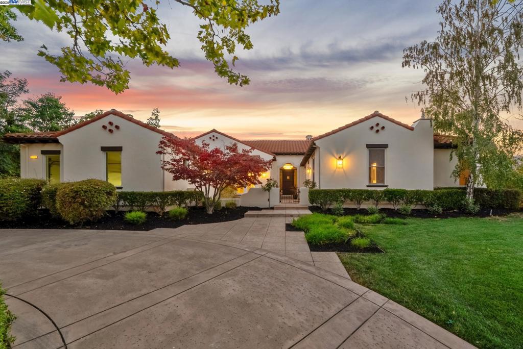 THIS IS IT! Welcome to the fusion of classic Santa Barbara style with modern designer upgrades. Elegant EAST facing custom home on an expansive .56-acre lot. Inside, soaring vaulted and beam ceilings, hardwood floors, and designer finishes create an elegant and inviting atmosphere. Elegant formal living room with soaring vaulted ceiling and modern fireplace, spacious formal dining room with custom chandelier and glass enclosed wine closet. The gourmet kitchen features quartz countertops, a center island, and professional stainless appliances, including a gas range and built-in refrigerator. The spacious family room features exposed beams, a custom fireplace, a wet bar, and French doors that open to the backyard. The impressive primary suite features vaulted ceilings, a spa-inspired bath with a soaking tub, a multi-head shower, and a huge walk-in closet with built-in shelving and organizers. The stately home office showcases beautiful built-in shelving. There is also a spacious bedroom suite with updated bath, along with 2 bedrooms sharing a Jack 'n Jill bath. The expansive yard features a sparkling pool & spa, raised garden beds, and ample lawn area. Nestled in a tranquil cul-de-sac within the gates of Ruby Hill. Welcome home!