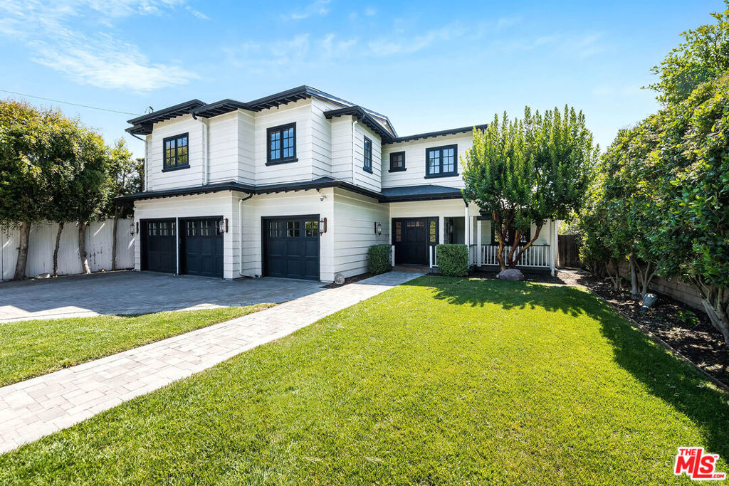 Nestled in the sought-after Hidden Woods enclave of Sherman Oaks, this newly remodeled Craftsman-style residence blends timeless character with elevated modern design. Five bedrooms, PLUS another three rooms used as a home office, playroom and babies room all on an oversized lot close to 9k square feet! The main level boasts a seamless, open-concept layout featuring multiple living areas including a media room, formal dining space, and an expansive living room that flows effortlessly into a chef's kitchen. Thoughtfully designed, the kitchen includes glass-front cabinetry, and ample room for entertaining. The luxurious upstairs primary suite impresses with vaulted, beamed ceilings, dual walk-in closets, and a spa-inspired bathroom complete with double vanities, a soaking tub, oversized shower, and custom tilework. Step outside to a lush, private backyard oasis (with room for a pool) perfect for entertaining or a quiet retreat with multiple lounge areas, a built-in BBQ with bar seating, and a cozy gas firepit surrounded by mature landscaping. Additional highlights include a gated driveway, three-car garage, spacious laundry room with sink and storage, zoned HVAC, and pre-wiring for sound and security systems. Ideally situated for both convenience and privacy, this exceptional home is a serene escape in the heart of Sherman Oaks.