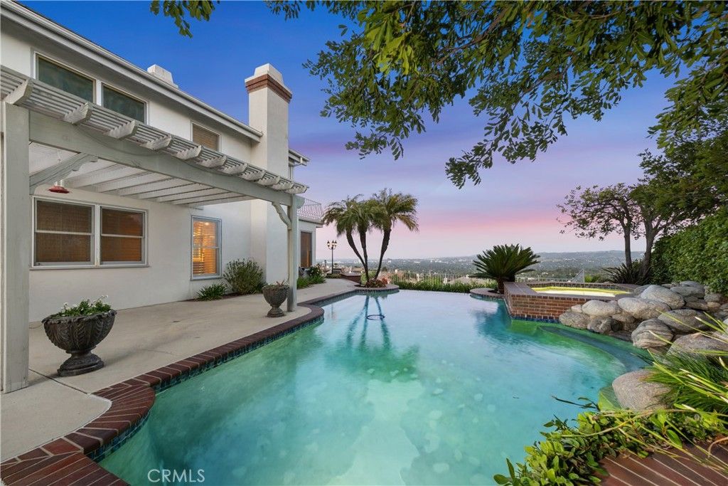 Photo of 24926 Vista Verenda, Woodland Hills, CA 91367 (MLS # SR25082831)