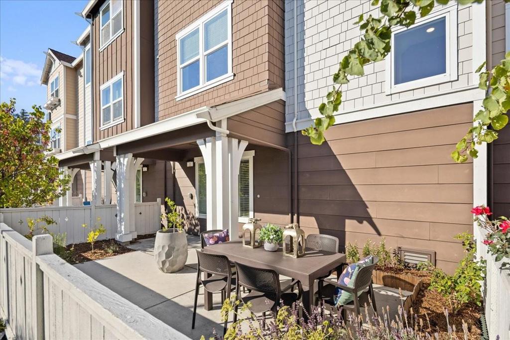 Step into modern comfort in this beautifully upgraded 3-bedroom, 2.5-bath townhome. The open-concept layout features high ceilings, engineered wood flooring, and a gourmet kitchen with quartz countertops and abundant cabinetry. The spacious primary suite includes a walk-in closet, dual sinks, and a private bathroom. Dedicated outdoor patio and balcony. Additional upgrades include solar, upgraded paint, carpeting, and double-pane windows for quiet comfort. The side-by-side extra wide 2-car garage provides ample storage with an EV charging option. Enjoy community amenities like a playground, BBQ area, picnic tables, and garden plots. Prime location with quick access to major tech employers, SFO, downtown San Mateo, and just a short distance to the Bay Trail and North Shoreview Montessori School, combining convenience, efficiency, and modern style.