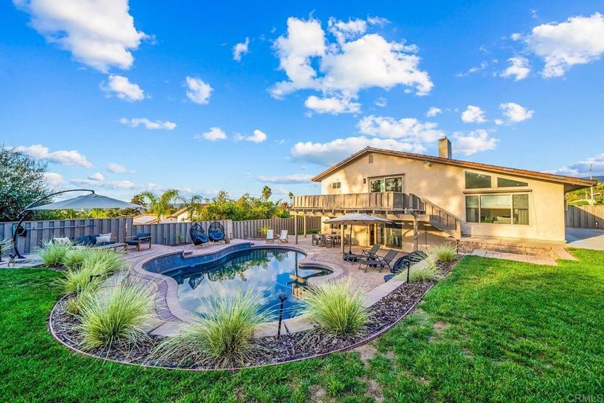 **SELLER MOTIVATED** Welcome to your dream home! This unique TRI-LEVEL POOL OASIS. Home sits on a sprawling .41-acre lot, offering a perfect blend of peaceful country living while being just minutes from the city. Enjoy breathtaking panoramic views, black-bottom pool complete with a new pump, and an array of fruit trees in your beautifully landscaped front and backyard. As you step inside, you'll be greeted by numerous upgrades that make this home truly special. A brand-new front door opens into a bright and inviting space with fresh interior paint throughout. The two fully remodeled bathrooms feature custom glass shower doors, a luxurious dual shower system, and elegant porcelain tile. The spacious living areas boast new laminate flooring, stylish metal stair railings, and ceiling fans in every room for your comfort. Cozy up by one of the two gas fireplaces on cooler evenings. The large bedrooms come with large closets, ensuring plenty of storage for your needs. With a large RV parking area equipped with a sewer clean-out, an owned solar system, and a family-friendly neighborhood, this home is perfect for families and outdoor enthusiasts alike. Don’t miss your chance to own this exceptional property in Bonita Highlands!