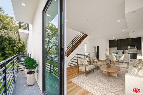Photo of 8664 Cadillac Avenue, Los Angeles, CA 90034 (MLS # 26105480)