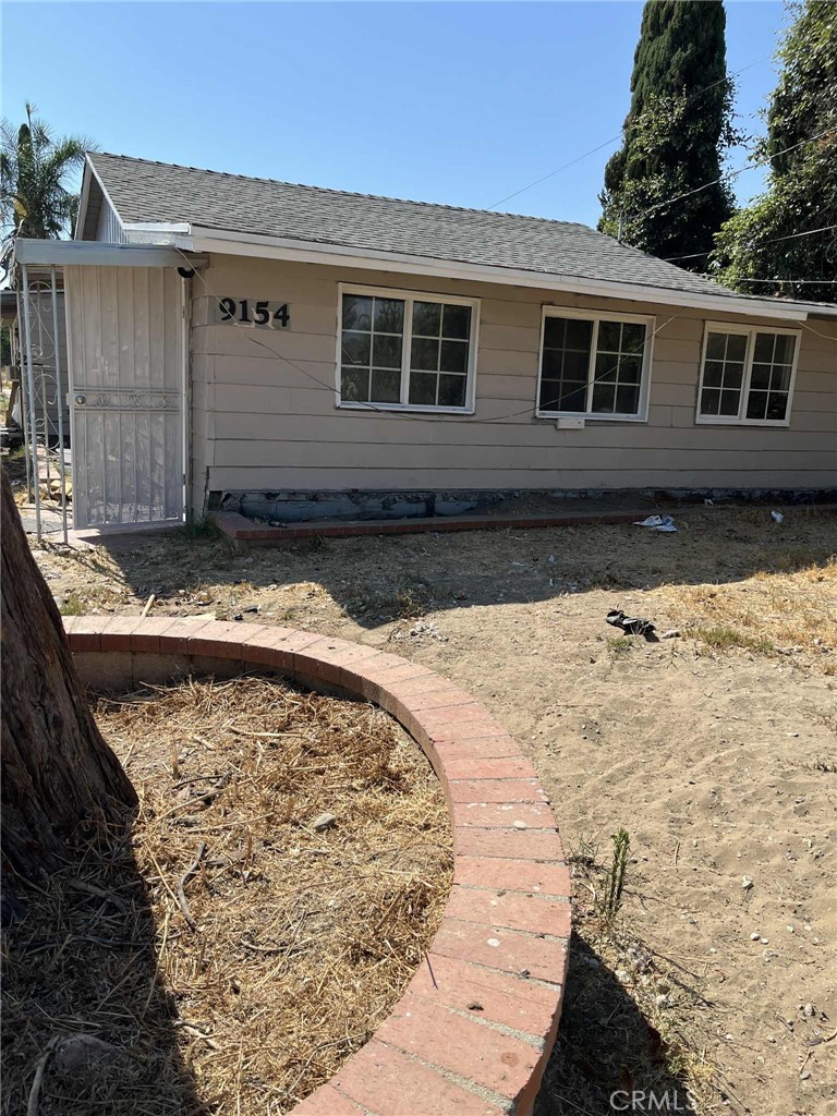 Homes on over 1/2 acre in city, with your own paved road leading to the front and back house and a storage building. New waterline with new bathrooms enclosures and toilets. New paint and flooring. front house has 4 bedrooms (or 3 plus bonus) with 1 bath. the back has 2 br 1 ba. no garage but plenty of parking. Priced way below market.