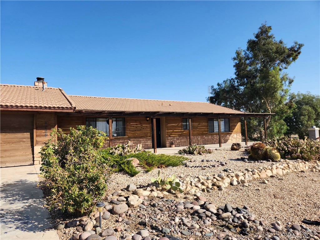 Hilltop Hesperia Home with Stunning Views – Perched high in the desirable Mesa area, this charming 3-bedroom, 2-bath ranch-style home offers breathtaking panoramic views and nearly 1 acre of usable land. Inside, enjoy an open-beam living room, fresh vinyl plank flooring, and a recently upgraded HVAC system for year-round comfort. The enclosed shaded patio and fully fenced backyard create the perfect setting for relaxing, entertaining, or expanding with your dream projects—RV parking, garden, or even an ADU. Single-story living, a peaceful location, and modern updates make this home move-in ready. A rare Hesperia On the Mesa find with space, privacy, and endless potential. Schedule your private showing today and make the Mesa lifestyle your own!