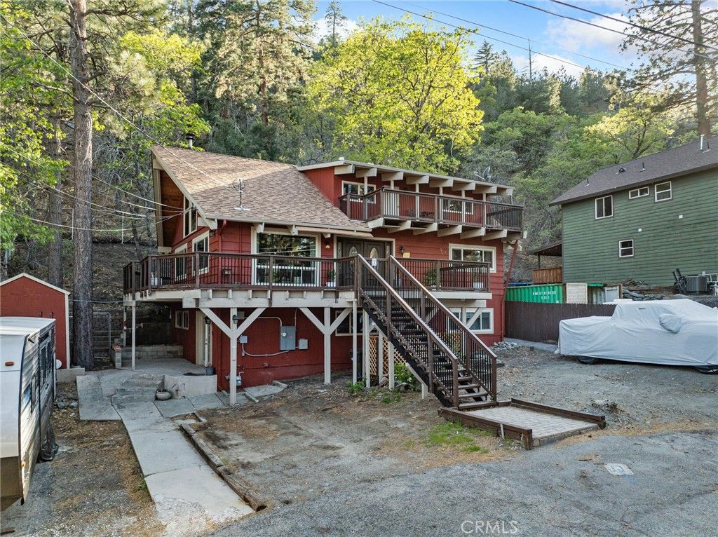 Photo of 1147 Twin Lakes Rd, Wrightwood, CA 92397 (MLS # HD26080579)