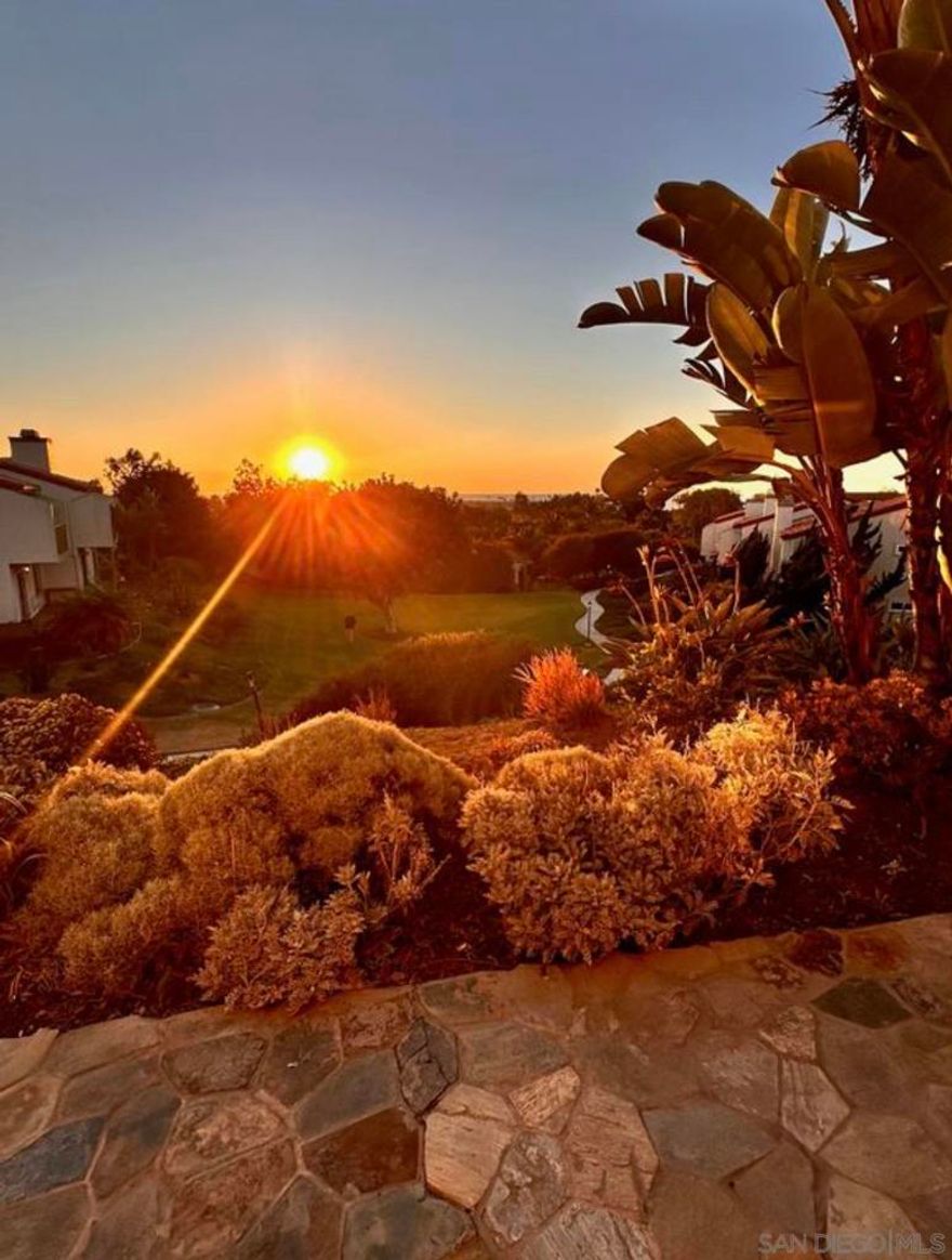 Seller will entertain offers between $799,000 - $849,000. Experience the charm and serenity of this ground floor coastal living end-unit in this 2-bed, 2-bath townhome style unit in the highly desired Alta Mira II complex in Carlsbad. Enjoy beautiful sunsets and peek-a-boo views of the ocean! Kitchen w/Stainless Steel appliances, granite counter tops, travertine floors, newer microwave and garbage disposal. Real hardwood flooring in main living areas, travertine flooring in dining area, kitchen, entry and bathrooms. Complex VA approved! Wood burning fireplace, crown molding and recessed lighting. New in-unit full sized LG washer/dryer.  Wood burning fireplace, crown molding and recessed lighting. New in-unit full sized LG washer/dryer. Generously sized ground floor patio sitting area w/cobble stone pavers to take in the amazing sunsets. Detached 1 car garage. Spectacular views of the green belt with the sea behind it. Excellent upper location within the community. Sparkling community pool and spa. 1/2 mile to ocean, close to freeways, transit, shopping, Carlsbad Outlet Mall, restaurants, pubs and so much more! Highly desirable Altamira II community boasts expansive greenbelts, mature trees, pool, sauna, jacuzzi & clubhouse. Excellent Carlsbad Schools: Carlsbad High, Aviara Oaks Middle, Pacific Rim Elementary. Complex is VA approved! A Must See!