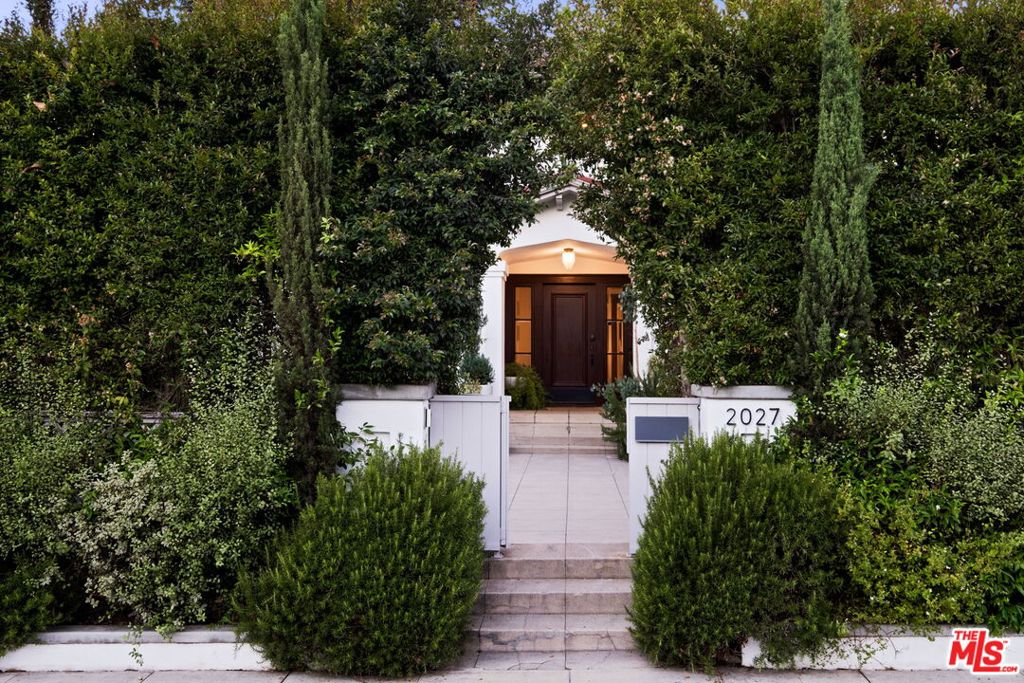 Located in the coveted neighborhood of the historic Hollywood Grove, this classy apartment is situated on the main floor of a privately gated DUPLEX and pairs old Hollywood elegance with functional modernism and style. Aside from its generous layout and original architectural details - such as a Batchelder wood burning fireplace, classic hardwood floors, and French doors and windows - you will find a spacious gourmet kitchen with oversized pantry and breakfast area, a light flooded dining room, a beautiful living room facing the private yard, and an office/den with a cozy alcove. The apartment features 3 bedrooms and plenty of closet space in all bedrooms. There is also the lush and peaceful private patio by the main entrance for that much needed wind-down time after work, a thriving front garden grown into wild perfection, and a shared outdoor dining area with citrus trees and a fountain by the kitchen entrance on the other side of the building - ready for your fresco get-togethers and small dinner parties. Breathtaking hiking trails up the road and the popular Franklin village with coffee shops, restaurants, bars and a market just a short stroll away - all situated in the secluded Hollywood foothills yet within a short driving distance to Disney, Universal, Paramount, Netflix, and all that LA's best has to offer. Weekly landscaping service is included, and the tenant pays utilities. 1 year maximum lease. Please contact listing agent with questions. Please DO NOT DISTURB tenant. Thank you!