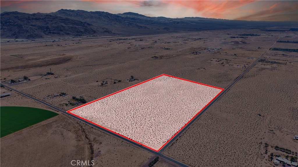 59.79 Acres with Paved Road Frontage in Newberry Springs – Power Nearby! Here’s your chance to own a rare 59.79-acre parcel in the heart of Newberry Springs, located just off main Newberry Springs Road.. This mostly flat, rectangular lot offers direct frontage on a paved road, with power lines running along the street—an ideal setup for those looking to build, farm, or invest. Zoned Rural Living (RL), this property is surrounded by custom homes, agricultural land, and wide-open desert views. With its accessible location and peaceful setting, it’s perfect for a private compound, a future ranch, or as a long-term land investment. Whether you’re dreaming of homesteading, creating your own desert retreat, or just securing a large parcel of land in a growing area—this one delivers. One more thing, This property has an abandoned well. It would be a good idea for the buyer to investigate to see about bringing it back into production.