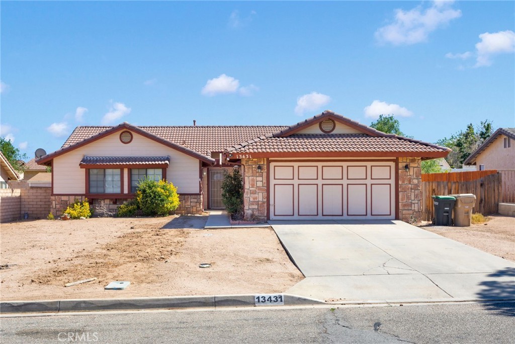 Commuter-Friendly 4-Bedroom, 2-Bath Home in Hesperia Features include The spacious kitchen which opens up to a large living room, which includes a rock fireplace. Enjoy the outdoors year-round with a covered patio—perfect for BBQs or relaxing evenings.
Close to parks, schools, and shopping, with easy access to major roads for commuters.
Attached 2-Car Garage: Plenty of space for parking and storage.