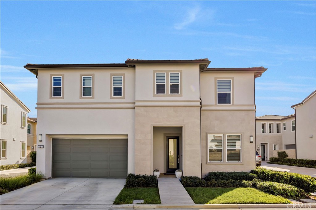 STUNNING EXECUTIVE HOME with four bedrooms and three bathroom, located in the prestigious new Meadows community by Toll Brothers! Featuring a modern exterior, open floor plan, soaring ceilings, designer upgrades, a downstairs bedroom, free solar power, and so much more. Step in from the charming front porch into a dramatic two-story foyer that flows into the great room—highlighted by towering ceilings, a wall of windows that flood the space with natural light, a sleek fireplace, and a sliding glass door leading to the beautifully landscaped backyard. The gourmet kitchen opens seamlessly to the dining and great room areas, boasting a spacious center island with breakfast bar, crisp white cabinetry offering abundant storage, premium stainless steel appliances—including a six-burner gas cooktop and built-in refrigerator—and generous counter space. Upstairs, the luxurious primary suite features an expansive walk-in closet and a spa-inspired bathroom. Two additional bedrooms share a well-appointed hallway bath with dual sinks. Enjoy resort-style community amenities such as a private clubhouse, two pools, two spas, cabanas, a cozy lounge with fireplace, outdoor BBQs, multiple parks, sports fields, and courts for basketball, pickleball, and volleyball. Miles of biking, hiking, and walking trails connect to the Serrano Creek regional trail system. All this with quick freeway access and just a short stroll to 24 Hour Fitness, Starbucks, Target, and countless dining options. This is one you don’t want to miss!