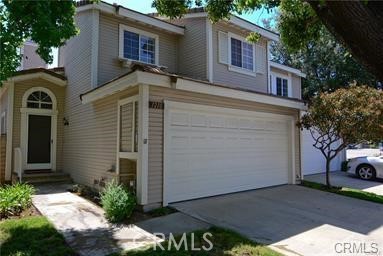 Great remodeled property in a very popular area in San Dimas. The home features a large open living room with cathedral ceilings and a cozy fireplace. The spacious kitchen has newer cabinets and quartz counter tops, newer flooring through out the home, most of the windows were just replaced with dual paned windows. The kitchen has a counter/bar that opens to the dining room. Dining room is good sized and leads to the backyard and cement patio with a cover. There is also a remodeled half bath downstairs and a laundry room, which leads to the attached 2 car garage. Upstairs is the master bedroom (which has it's own remodeled bathroom,), 2 other bedrooms and a remodeled bathroom off the hall. There is room to park two cars in the driveway. Close to the great colleges, mountains, parks, trails, shopping, buses and great freeway access. Association features a pool, RV parking access and sidewalks throughout the complex for those nice walks. This home is in the desirable Bonita School District. Oh, and a great back yard with room to garden if you like.