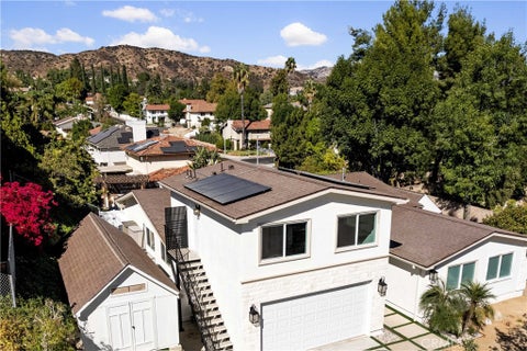 Photo of 7469 Pomelo Dr, West Hills, CA 91304 (MLS # SR26233378)
