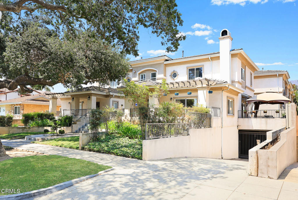 Located in Oswego Village, a gated 11-unit community nestled in a quiet Pasadena neighborhood, this newer-built three-level townhouse offers 2 bedrooms, 3 bathrooms, and an attached two-car garage. The main floor features a bright living room with a fireplace, a powder room, and a kitchen equipped with stainless steel appliances, including a refrigerator, gas stove, and oven, along with a dining area. Sliding glass doors in the dining area open to a secluded patio, while double doors in the living room lead to a front patio. A staircase in the dining area provides direct access to the private 2-car garage within the gated underground parking structure. Upstairs you'll find a spacious loft, perfect for a home office, along with a bedroom and full bath. The top floor is dedicated to the primary suite with a private balcony and en-suite bathroom. Additional highlights include in-unit laundry, central heat and air, and secure community entry. Conveniently located near schools, parks, shopping, dining, freeway access, and all of the other wonderful things that Pasadena has to offer.