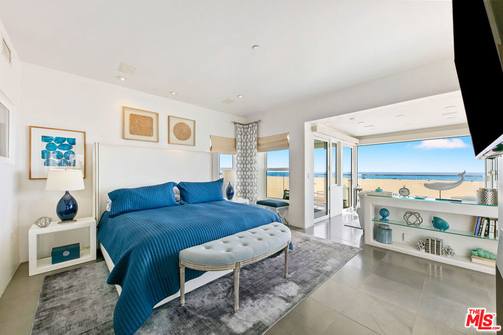 Affectionately known as the Barbie House, this stylish and fully updated beach retreat offers the ultimate Santa Monica getaway. With breathtaking ocean views from all three levels, every moment here feels like a dream brought to life. Take in sweeping, panoramic vistas of the Pacific, the iconic Santa Monica Pier and Ferris wheel, and vibrant Southern California sunsets from the expansive rooftop deck, perfect for morning coffee or sunset cocktails. Inside, the home is fully furnished and move-in ready, complete with plush linens and a well-equipped kitchen. The serene primary suite includes its own private deck overlooking the sand, while two additional en-suite bedrooms provide comfort and privacy for family or guests. The bright and airy great room is made for entertaining, featuring sliding glass doors that open to yet another ocean-view deck. A modern stainless steel kitchen and cozy breakfast nook make dining a delight, whether you're whipping up a quick bite or hosting a sunset dinner. Just steps from the heart of Santa Monica, you're perfectly positioned to explore local boutiques, beachside cafes, the world-famous pier, and bike rentals. This home blends the ease of beach living with the excitement of the city. The owner is open to shorter-term and summer rentals at a premium rate.