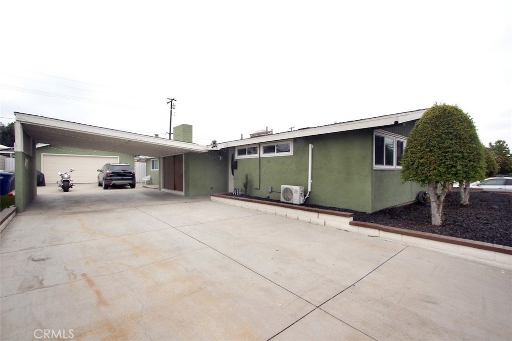 Pride of ownership shines in this 4-bedroom, 2-bath home located in La Mirada, offering 1,701 sq. ft. of living space on a spacious 8,908 sq. ft. lot. The home features a cozy living room, a large family room, and a spacious kitchen with ample cabinet space. One of the bedrooms is a master with an updated master bath, and the second bath has also been updated. The property boasts a nicely sized front yard and a large backyard with a patio deck, perfect for relaxing or entertaining. Additionally, the home includes a long driveway for ample parking and a garage. the home also has spit heating and air energy saving units. A must see. Home is contingent on seller finding a replacement home.