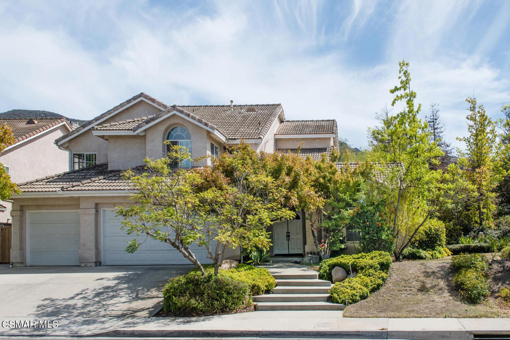 Welcome to this spacious 4-bedroom, 3.5-bath home in the heart of Newbury Park, spanning 2546 SF and perfectly situated on an expansive .8-acre cul-de-sac lot. The home offers a bright and inviting layout, with a kitchen that seamlessly opens to the family room, complete with a cozy fireplace and custom built-ins. The primary suite is a private retreat, featuring its own fireplace, a generous walk-in closet, and a large bath with a soaking tub and separate walk-in shower. Step outside to discover endless possibilities--the backyard feels like your own private park with a large covered patio, greenhouse, picnic area, and RV access. The lot provides rare flexibility and room for everything you can imagine: a pool, sport court, horse facilities, an ADU, or all of the above. With so much usable space, incredible privacy, and a prime cul-de-sac location, this property is a true gem. Homes with this much potential and land are a rare find--don't miss the opportunity to make it your own!
