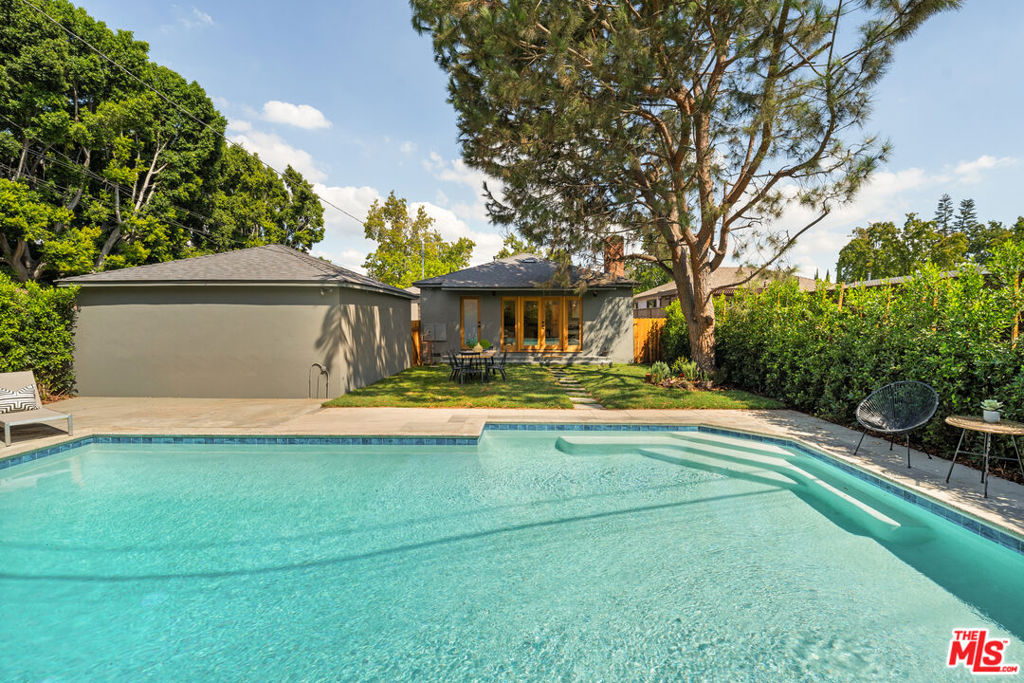 A newly remodeled 1950s entirely vacant duplex with a flat grassy yard and a large private pool located on a tranquil cul-de-sac street in prime Atwater blocks away from shops, cafes, the elementary school, bike path, and restaurants. Situated on a large 8,434 sq. foot professionally landscaped lot with the potential to modify into a single-family home and convert the large, detached 2-car garage into an ADU (check with your contractor/architect). The owner's back unit feels more like a home than just a unit. Walk through the front door into a spacious L-shaped living room with gleaming hardwood floors (throughout), vintage casement windows, and a sitting area perfect for watching your favorite movies and shows. The remodeled cooks' kitchen with breakfast nook features a brand-new professional 6-burner cooktop range, beautiful quartz countertops, an apron-front farm sink, honed stone flooring, a new stainless-steel side-by-side refrigerator, dishwasher, and a pass-through countertop that leads to a built-in buffet with abundant cabinetry. Just off the kitchen is a large, open family room with a dining area, wood-paneled walls, a stacked stone fireplace that anchors the room, and French doors that create the ideal indoor-outdoor flow, opening onto the grassy play yard and a large, private swimming pool. There are two spacious bedrooms, both with built-ins, and one features a desk. The penny-tiled main bath has been remodeled with a new soaking tub with a shower, a new vanity, and a statement light fixture. The home office features ample storage and a three-quarter bath, complete with a door that leads out to the pool. The washer and dryer hook-ups are just off the family room. The spacious, sunny 2-bedroom/1-bath front unit is ready to rent (estimated rental price: $3,400) or can be used to house a family or friends or make a fantastic home office. The full bath has been remodeled, and the tiled kitchen features new stone flooring and quartz countertops (and sink), along with a dryer hookup. Recent upgrades include a new roof, new central air and heat in both units, two new electrical panels, and a replastered pool with new equipment. An excellent offering in a fantastic and central neighborhood, ready for immediate move-in.