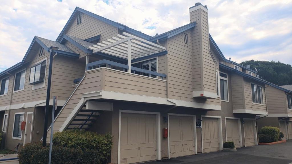 This beautifully remodeled townhouse style condo in Edgewater Isle features a relaxing and serene view of the lagoon from the front patio. The vaulted ceilings in the living room and bedroom enhances the feel and makes it seem even more spacious. An additional loft on the upper level can be a flexible space for an office or guests. The kitchen has been remodeled with new cabinets and quartz counters and features a lovely garden window perfect for a little potted herb garden. The remodeled bathroom is accessible from both the hall and the bedroom and offers dual sinks with plenty of storage in the vanity. The walk-in closet is well organized with built in shelves and drawers. In-unit laundry is located in the loft and a one car enclosed garage is found right below the unit. This is a lovely community with swimming pools, spas, and beautiful grounds and paths around the lagoon with excellent convenience to dining, shopping at Bridgepoint Shopping Center and easy access to transportation. This is the perfect place to call home. - 12 month minimum lease. No pets. No smoking.