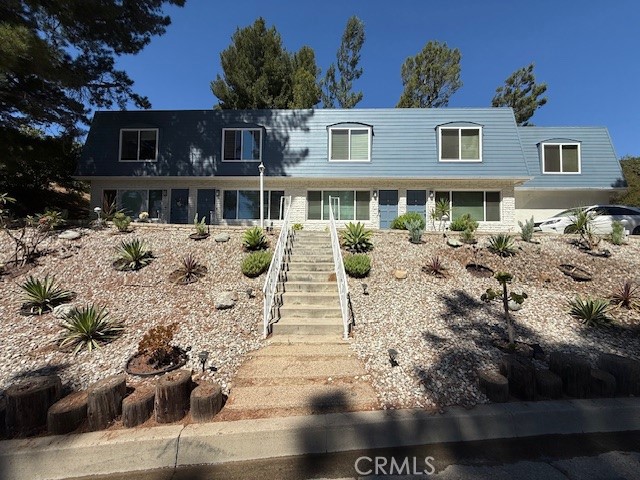 Welcome to 115 Olinda Pl. Nestled in the picturesque community of Olinda Village, this great income producing four unit property offers the perfect blend of comfort and character. A hidden gem in the heart of Brea, right off of Carbon Canyon Road this property is a haven of warmth and tranquility.
As you approach the property, you’ll be immediately drawn to the eye catching curb appeal with newly redone drought tolerant landscaping and sprinkler irrigation system and a welcoming front entrance view. Inside each of these units are two story floor plans featuring spacious living areas, central air and heating and indoor washer and dryer hook ups and dual pane energy efficient windows illuminating the interior with natural light with an open airy feeling. The kitchen offers ample counter space and a cozy breakfast nook. Adjacent to the kitchen is a comfortable living room ideal for relaxation or family gatherings. The bedrooms are located on the second story offering generous closet space and a serene atmosphere to unwind at the end of the day. Step outside into the enclosed backyard patio area perfect for outdoor barbeques, gardening, or simply enjoying the quiet canyon surroundings of Olinda Village. Residents of Olinda Village enjoy the best of both worlds—seclusion and community with a close-knit neighborhood and top-rated school district. Don't miss the opportunity to call this great income producing property your own.