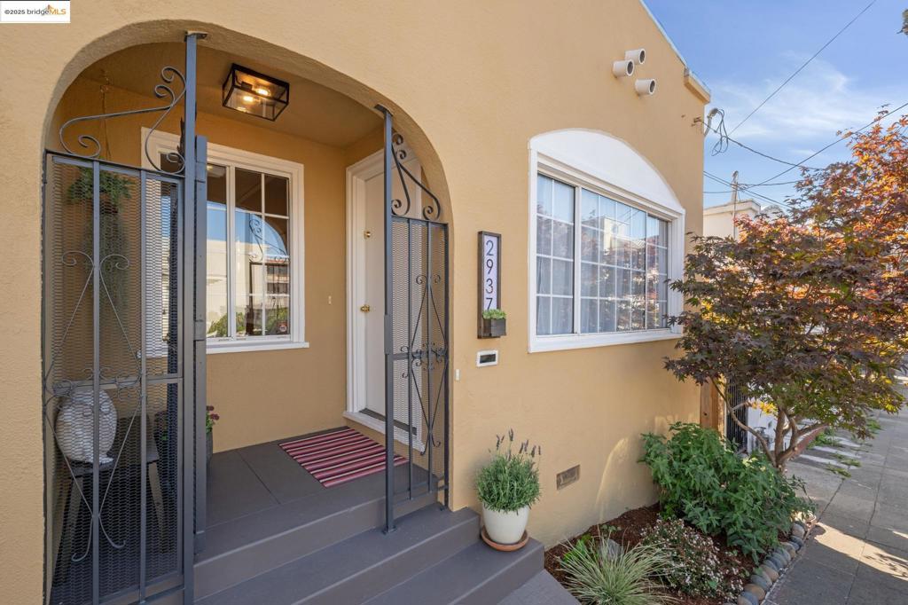 Charming 2-bedroom, 1-bathroom home designed for easy living. Centrally located, this property is blocks away from Dimond District shops and restaurants, parks, public library, freeway, and public transportation. This home is anchored by a welcoming living room dining room combo with a decorative fireplace. A well-appointed kitchen provides ample counter space and storage. Off the kitchen, discover an additional versatile space ideal for an office, music nook, or crafts corner. A glass door at the end of the room offers abundant natural light and opens to an inviting sunny patio for al fresco dining or a quiet afternoon nap. Two bedrooms with functional closets. Refreshed bathroom with skylight over the tub. This home is a blend of charm and practicality - ideal for those looking for the low maintenance of a condo with the privacy and independence of a detached home.