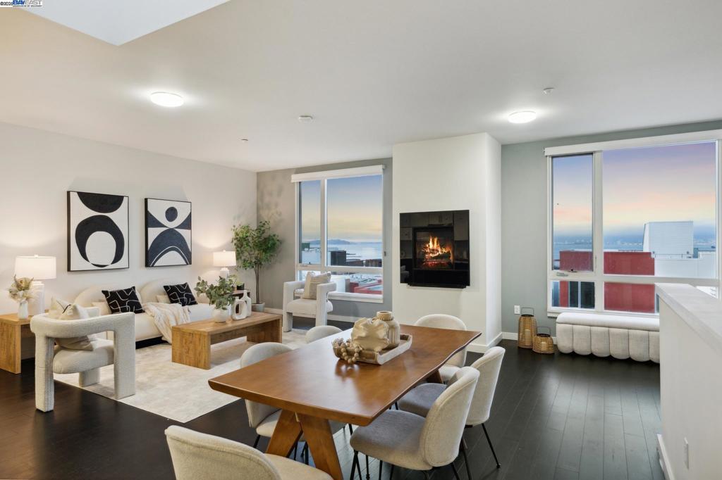 Stunning 3BR/2BA (3rd BR is currently an office). Condo with BayViews in SF Shipyard! Located in a secure, gated building with a 1 car garage, this home offers an open and light-filled living space. The chef's kitchen is an entertainer's dream, complete with an expansive island, quartz countertops, a gas range, wine fridge, and stainless steel appliances. The first-floor primary suite features a walk-in closet, walk-in shower, and serene views. A second bedroom, full bathroom, and laundry are also conveniently located on the same level. The versatile den is perfect for a home office or guest room. Enjoy the vibrant community amenities, including scenic walking paths, a playground, and BBQ areas. You're just a 10-minute drive from South Beach, the Chase Center, and Mission Bay, with easy access to freeways, SFO, and the Peninsula. Plus, exciting new developments like the 10-acre India Basin Park (2026) and the recently opened 900 Innes food court are just steps away! OPEN HOUSE SAT 2-4PM Views: Downtown