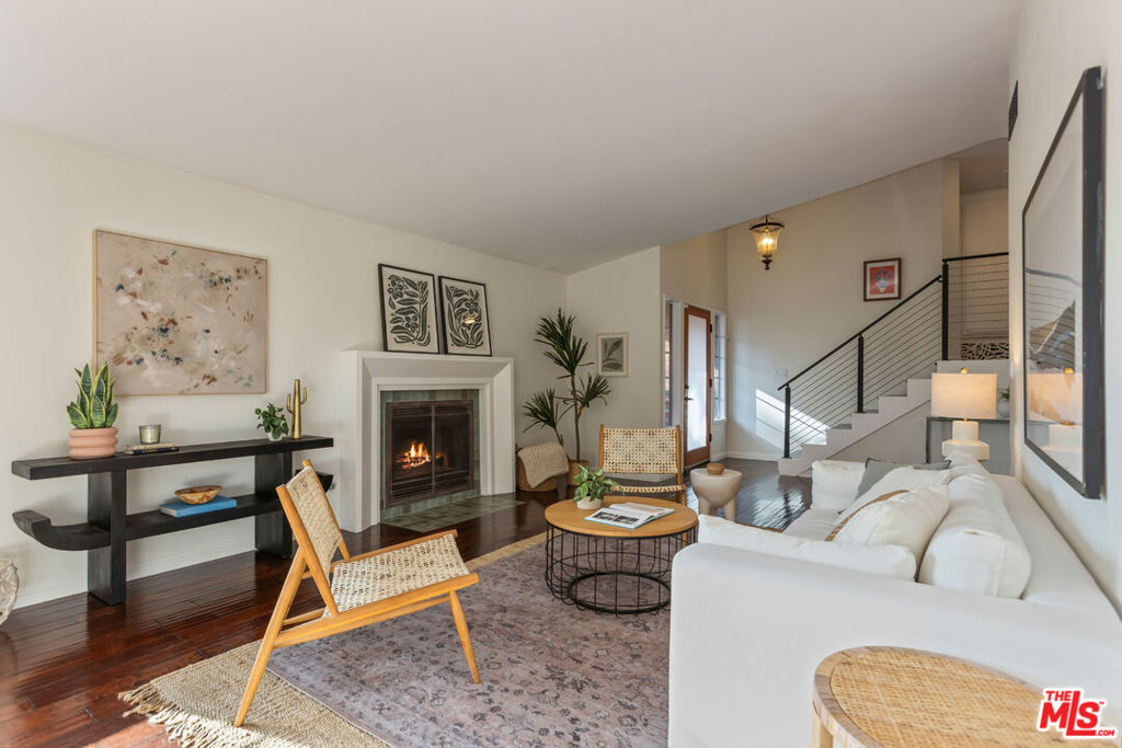 Perched above the city in Glassell Park, this spacious hill home offers 1,886 sq ft of comfortable living and serene hillside views on a quiet road. The inviting layout includes a formal dining room, a generous kitchen with abundant cabinet storage, and a bright living area with a fireplace and stunning viewsEnjoy modern comforts with paid-for solar, an EV charger, and a sparkling pool surrounded by a multi-tier yard designed for relaxing. The attached three-car garage provides exceptional storage or potential for additional living/work space, with extra driveway parking for guests. A rare combination of views, versatility, and sustainability all in one of Northeast LA's most desirable neighborhoods.