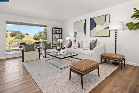 Photo of 3136 Ptarmigan Dr #6, Walnut Creek, CA 94595 (MLS # 41132366)