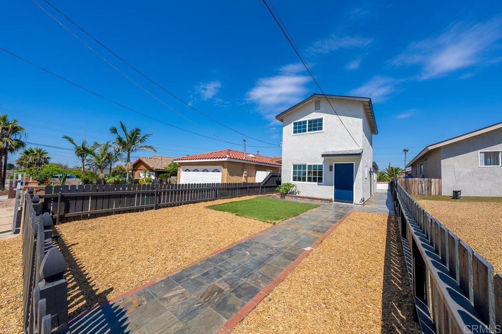 Appealingly unique renovated home with upgrades throughout! Step into this updated, loft-style home featuring a fully remodeled kitchen, complete with stainless steel appliances, sleek butcher block countertops, and modern finishes. The bathrooms have been thoughtfully redesigned with contemporary fixtures and designer tile. Enjoy peace of mind with a brand-new roof, updated lighting, and stylish new flooring throughout. Energy-efficient windows fill the space with natural light while keeping utility costs down. Upstairs, the spacious primary suite offers a serene retreat with a private, well-appointed bathroom and a west-facing view perfect for sunsets. The rear of the home has ample parking- accessible from the alley. This move-in ready home combines charm, function, and style—don’t miss your chance to make it yours!