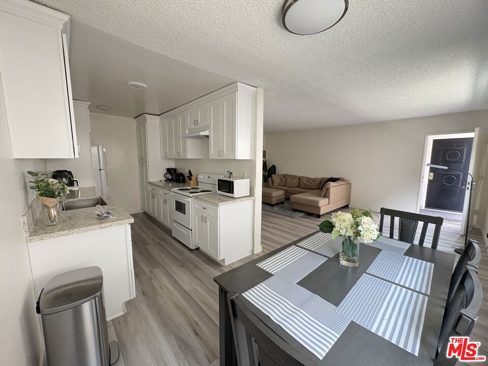 This is a spacious 1-bedroom, 1-bath apartment in the heart of West Hollywood. The whole unit has hardwood floors and an open living area. One parking space is available. Coin laundry is inside the building. The building is pet-friendly, with a pet deposit and pet rent. The owner pays for water and trash only.
