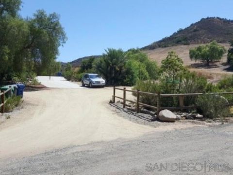 Photo of 8209 Mesa Rd, Santee, CA 92071 (MLS # 260007564SD)