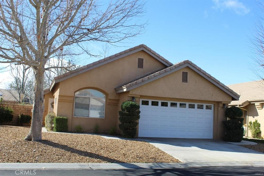 For Rent - Welcome to this beautifully maintained 2 bedroom, 2 bath home located in a peaceful and private 55+ gated community of Wyndham Rose. Offering 1349 Square Feet of comfortable living space. This residence includes a spacious two-car garage and a lovely side yard perfect for relaxing, just off of the Primary Bedroom. Kitchen has ample natural lighting and offers a serene eating nook area to relax while sipping your favorite beverage. Living space is large with a more formal dining area. Inside laundry space centrally located between both bedrooms. Enjoy the quiet charm of this intimate neighborhood which features scenic greenbelt pathways ideal for morning walks or evening strolls, near the lush golf course. This community is conveniently located near shopping centers, popular restaurants and everything you need in just minutes away. Whether you're looking to downsize or enjoy a low maintenance lifestyle in a vibrant, adult community, this home offers the ideal blend of comfort and convenience.