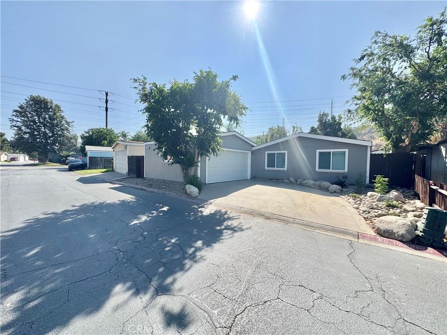 Fully remodeled and ready to move in!! This spacious 2 bed 2 bath home features upgraded kitchen, bathrooms, new windows, new floors, new AC and fresh paint. Located in the gated community of Rancho Mediterrania with amenities such as pool, spa and clubhouse this one is sure to go fast! Stop in today to come see for yourself you will not be disappointed!