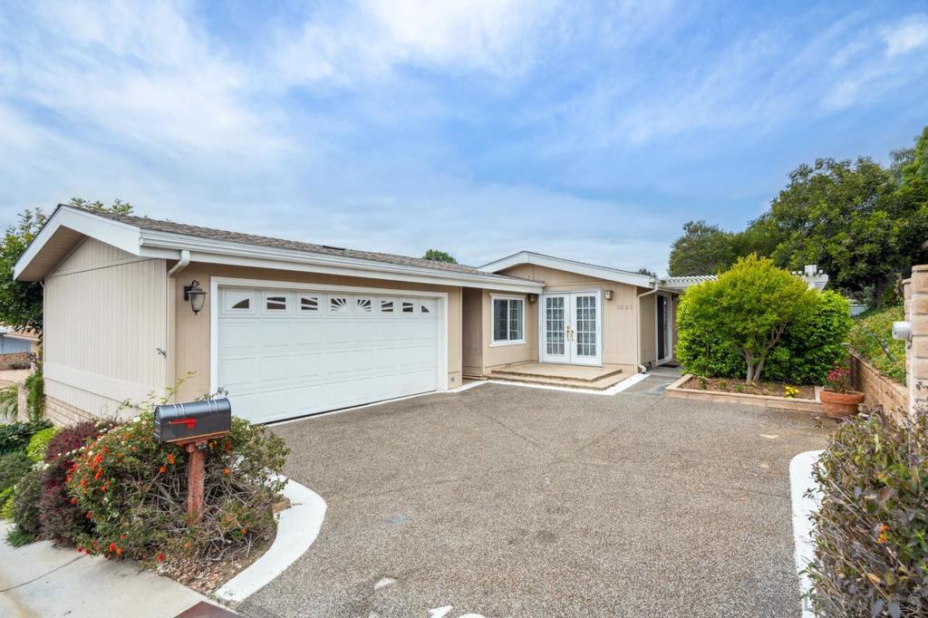 **55+ Community** One of the largest floor plans in the highly desirable senior complex of Via Verde Estates with 3 bedrooms, 2 bathrooms and 1,824 sf. This land owned manufactured home is on a permanent foundation (433A). Features include vaulted ceilings throughout, French door entry with vanishing screens, laundry room with storage & pantry, open kitchen with double oven, central heat & A/C, large bedrooms, primary bedroom with huge walk-in closet and en-suite bathroom, beautiful spacious patio and a 2-car garage with room for 2 cars in the driveway. The complex has a low HOA fee & features a pool, hot tub, bbq area, exercise room w/pool table, card room, book room, and kitchen & large meeting room.