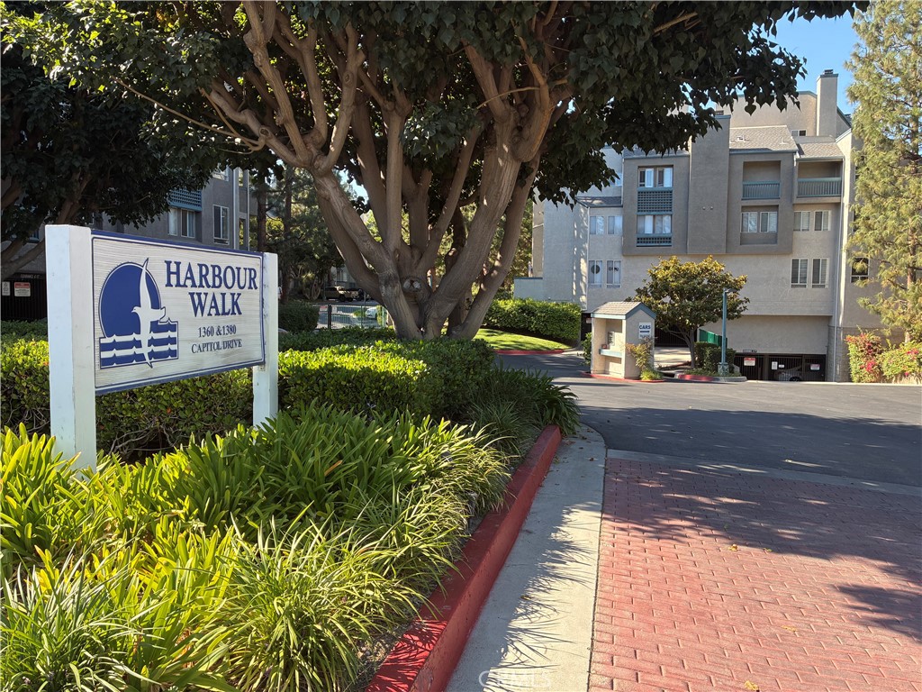 Welcome to a beatifuly designed two-level condo in a highly desirable gated community of the Harbour Walk. This unit is located on the second floor which provides additional tranquility. The unit can be easily accessed through elevator or staircase. As you enter the unit, you are captured by the spiraling ceiling height and the inviting living room with stunningly designed windows that capture ample natural light and warmth. You are welcomed into an open-concept living and dining area furnished with a cozy fireplace, perfect for relaxation. The kitchen includes plenty cabinetry, providing ample storage space. The primary suite is located on the lower level, which includes a walk-in closet, full bathroom and access to the balcony. Upstairs is a multipurpose loft-looking bedroom with its own full bathroom. Although officially recorded as second bedroom, it is designed in such manner that could function in addition as the second bedroom, an office setting, exercise room, area for creativity or just a space to be used to spend time relaxing. The unit is equipped with central air conditioning and heating and also features in-unit laundry, and two storage closets located within the living room and in balcony. There are two parking spaces within a gated subterranean parking area that is specifically assigned to this unit. The amenities provided by the Harbour Walk community includes gated sparkly pool and two spas, clubhouse, BBQ and enjoyment sitting area. This ideal location is in walking distance from shopping, dining, parks, top-rated schools, and just minutes away from 110 freeway. This is a great opportunity to live in the most sought-after area of San Pedro, neighboring the greatest areas of the South Bay and its wonderful coastal beauty. A true must-see! A wonderful place to call home. Don’t miss this opportunity to call this attractive home, your own!