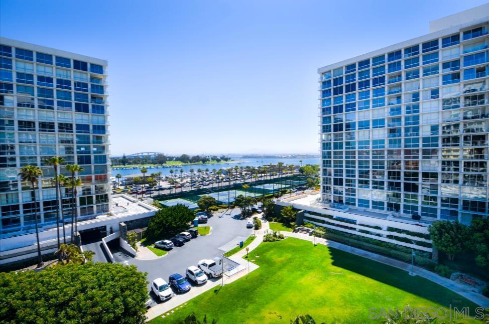 Welcome to our stunning one-bedroom, one-bathroom unit located in the beautiful Coronado, CA. Enjoy breathtaking Bay Views from the comfort of your own home. Stay active with access to our tennis court, gym, and pickleball courts. Take a dip in our refreshing swimming pool or take a short drive to the nearby military base. With convenient proximity to restaurants and shops, you'll have everything you need right at your fingertips. This short-term furnished rental is the perfect place to vacation. The unit is equipped with new windows, new flooring, electric power shades, and high-end appliances including a washer/dryer. La Sierra Tower is a highly sought Coronado Shores tower due to the close proximity to the Hotel Del. Amenities include pools, tennis courts, gym and Beach Club. Rates vary depending on length of lease and time. The condo is not available for a summer rental.