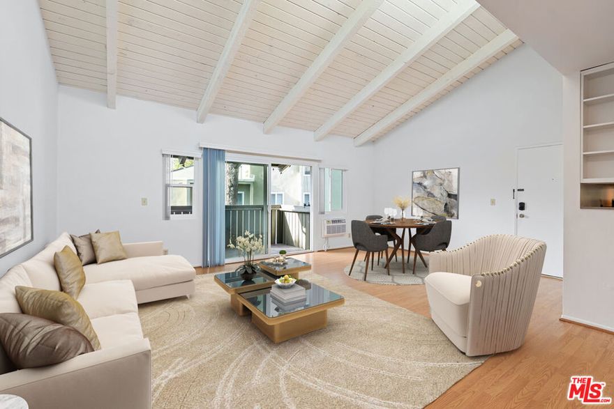 Welcome home to this updated top-floor 2-bed, 2-bath condo in the serene, woodsy Tara Hill security complex of Culver City. Step into a bright and airy living room featuring soaring beamed ceilings, clerestory windows, and stylish laminate wood flooring. Enjoy your morning coffee or unwind at sunset on the private balcony overlooking peaceful treetop views. The updated kitchen shines with stainless steel appliances and quartz countertops, offering a clean, modern feel. The primary bedroom includes its own ensuite bathroom for added comfort and privacy. Tara Hill offers a resort-like lifestyle with access to two sparkling pools, relaxing spas, fitness rooms, and a clubhouse with sauna.  Nearby landmarks & highlights include the Baldwin Hills Scenic Overlook, Culver City Stairs, Ballona Creek Bike Path, Sony Studios, Downtown Culver City with hip restaurants and nightlife, the Kirk Douglas Theater, Culver Hotel, Helms Bakery & Design District, Platform LA, Culver City Farmers Market, Culver City Arts District and Marina Del Rey.  *Please note: There is no in-unit laundry, but convenient common laundry rooms including one nearby are located throughout the community.