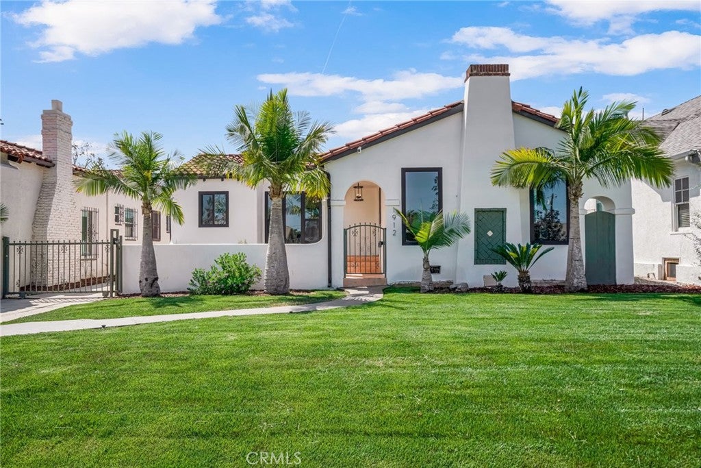 Photo of 1912 W 76th ST, Los Angeles, CA 90047 (MLS # DW26191854)