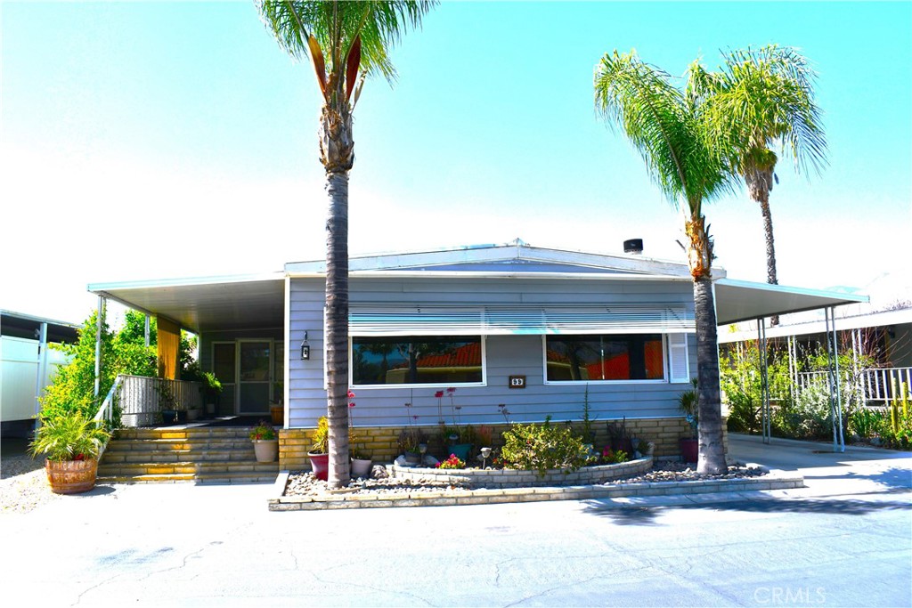 Price Reduction Seller Motivated!! This Great Mobile Home across the street from Soboba Springs Casino!! Offers a vibrant and active lifestyle. Nestled in a gated 55+ community, it features a range of amenities designed for relaxation and recreation. Residents can enjoy a pool, spa, for unwinding, as well as a game and craft room for creative pursuits. For fitness enthusiasts, there's an exercise room and tennis court, while those who enjoy leisure activities can make use of the billiards room. The community also boasts a picturesque lake, adding to its serene charm. It's a perfect blend of comfort and activity in a scenic' The breakfast bar and open floor plan create a spacious and welcoming vibe, perfect for entertaining or enjoying a casual meal. Carpet in the bedroom offers a cozy touch, while vinyl flooring in the kitchen and bathrooms is practical and easy to clean. All appliances included.